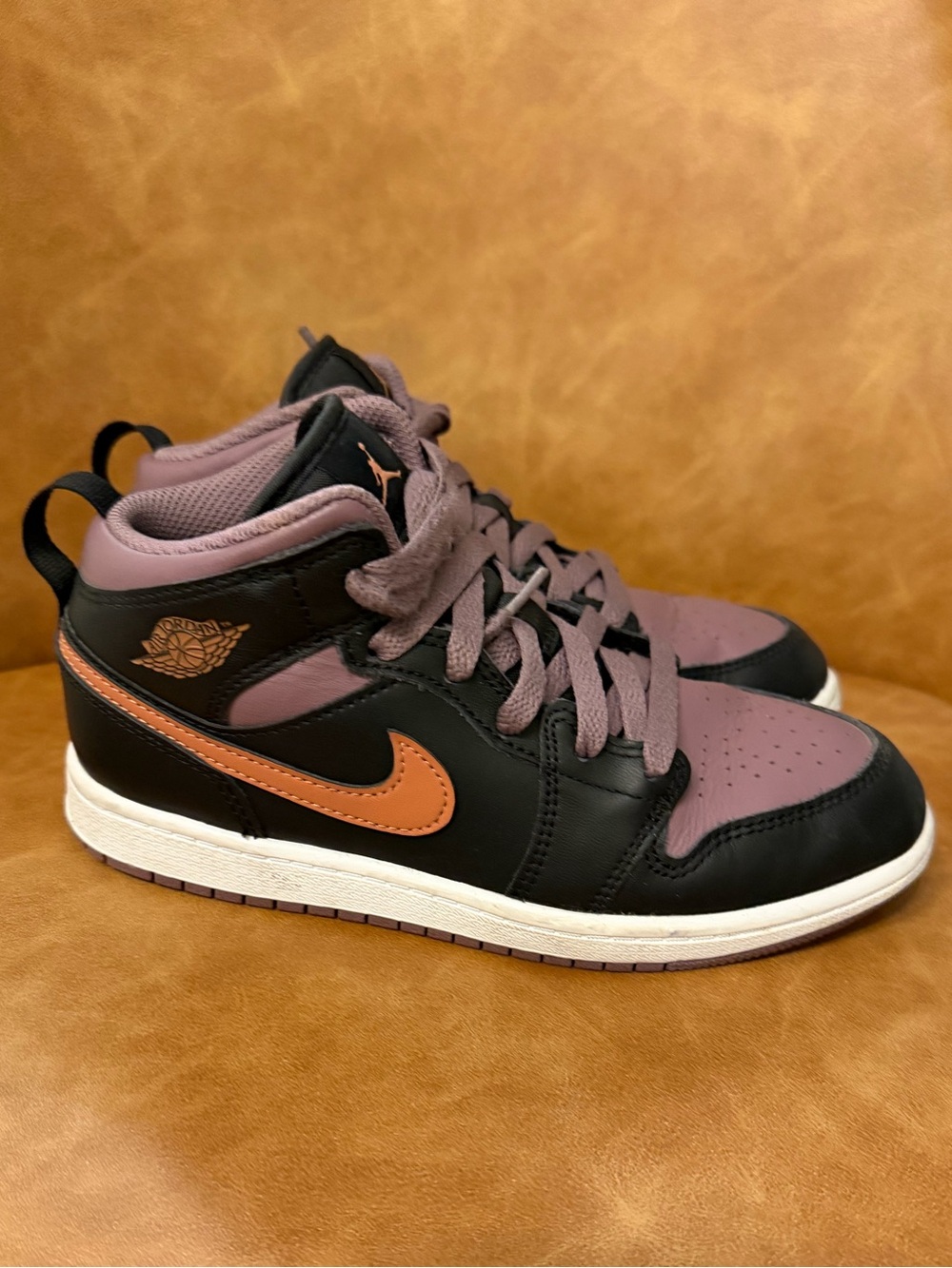 Jordan Nike Kids' Mid-Top Sneakers in Black, Mauve, and Orange. Size 3Y